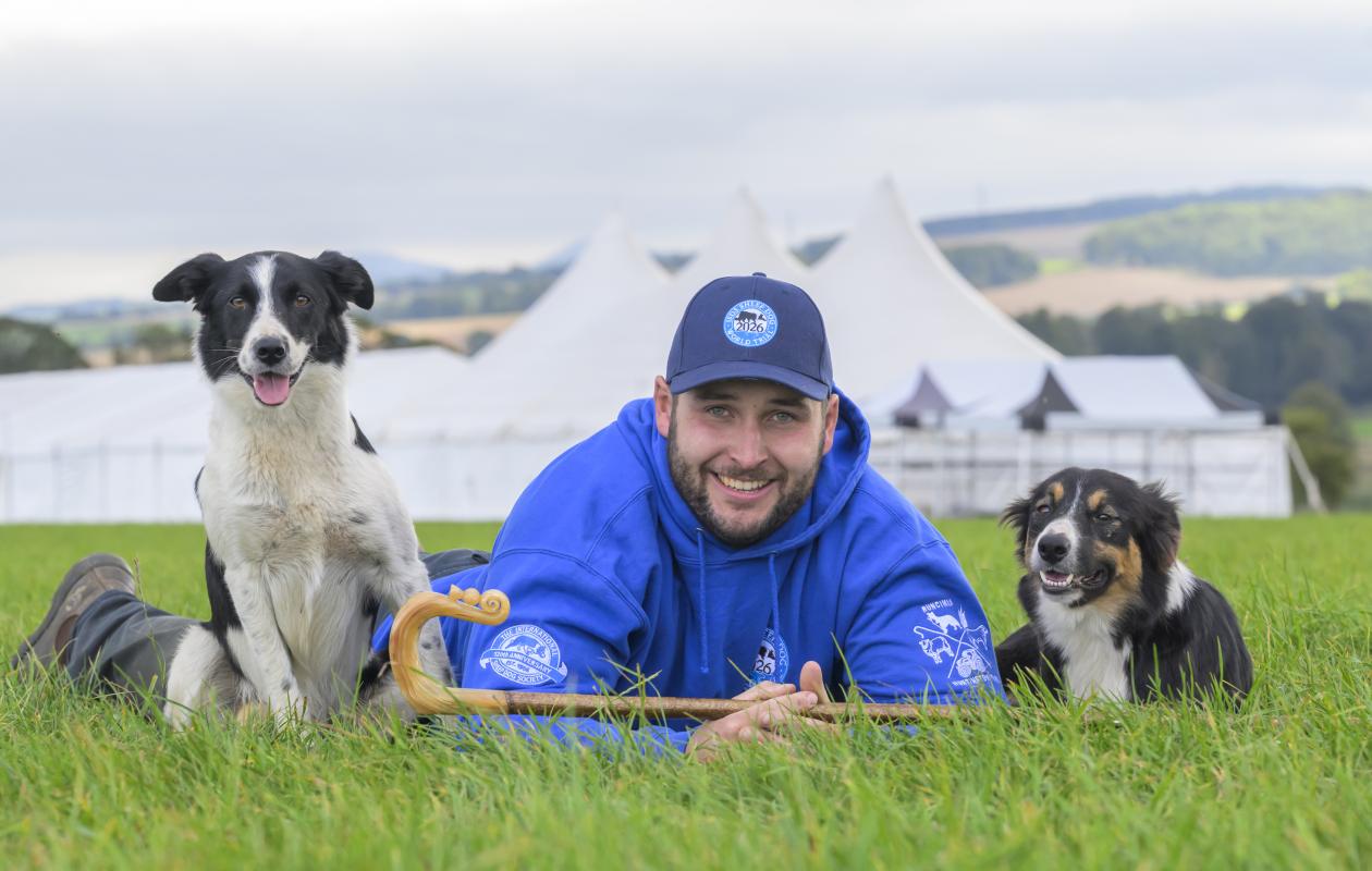 Ewan Runciman with two sheepdogs